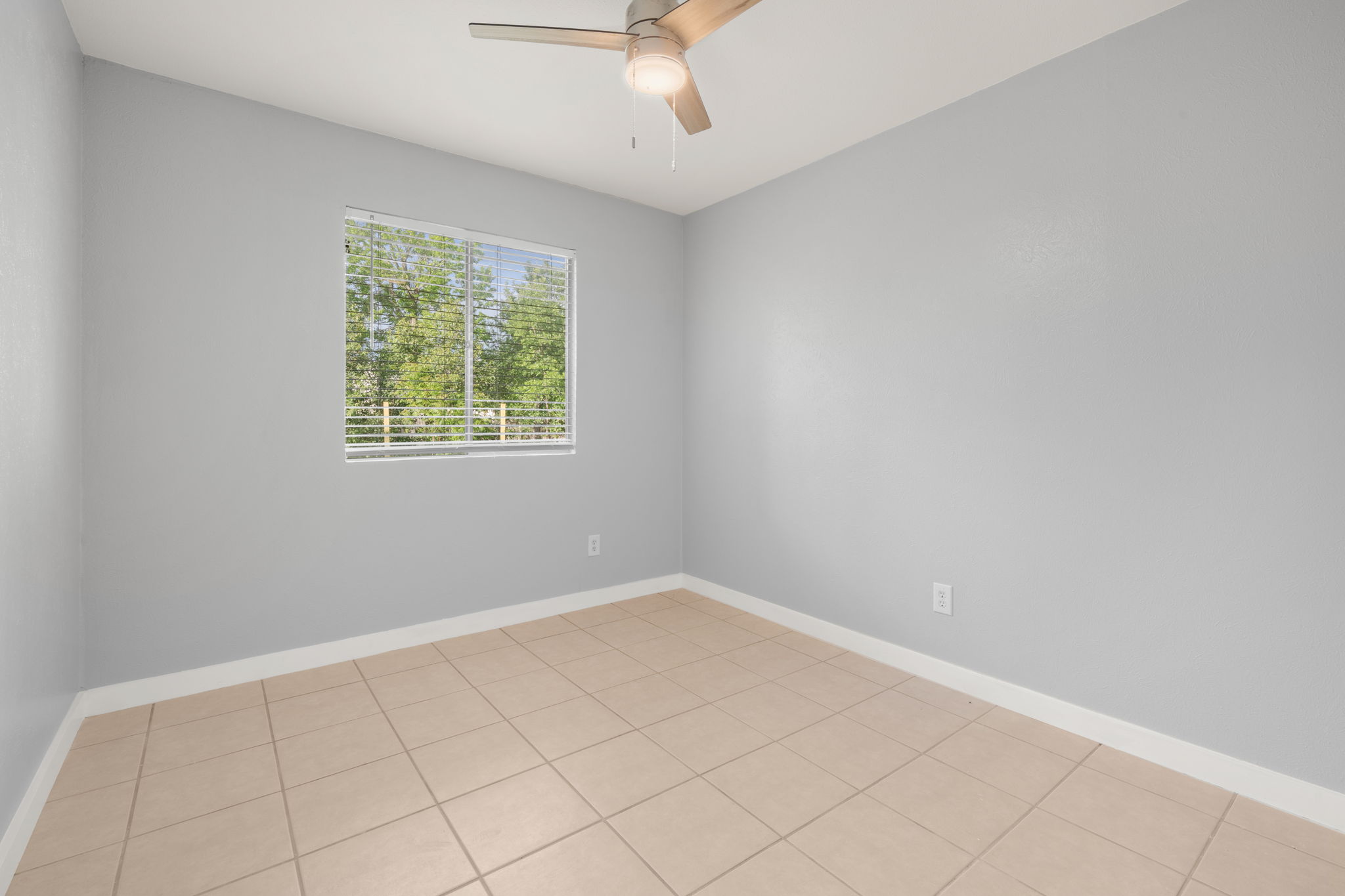3917 Leafield Drive Austin, TX 78749 - Photo 20 of 40 Bedroom # 3 featuring baseboards and a ceiling fan