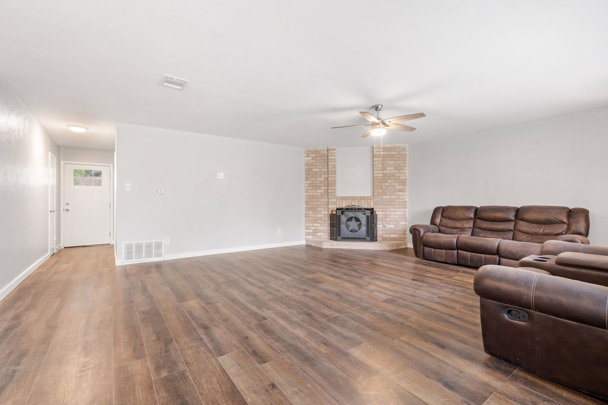 3917 Leafield Drive Austin, TX 78749 - Photo 28 of 40 Living area featuring ceiling fan and dark wood-type flooring