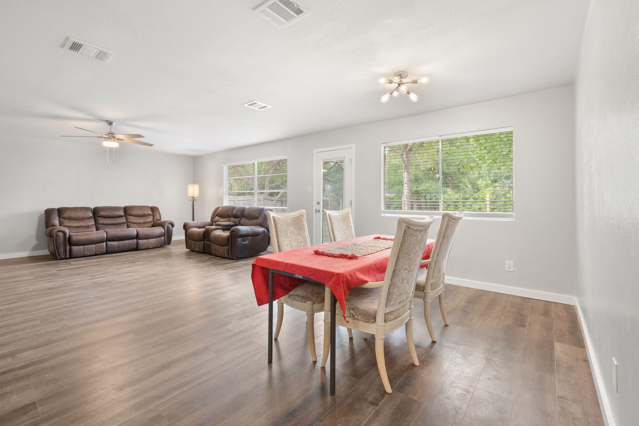 3917 Leafield Drive Austin, TX 78749 - Photo 29 of 40 Dining area featuring dark wood-style floors and ceiling fan