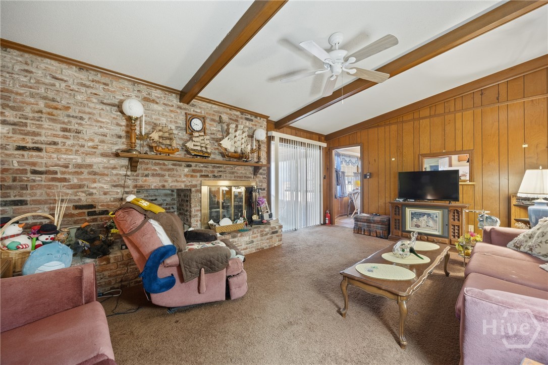 313 Wellington Road Savannah, GA 31410 - Photo 13 of 34 Living area that open to back sunroom