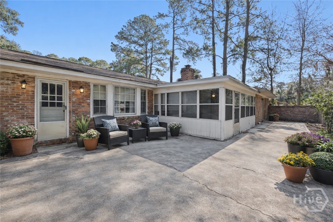 313 Wellington Road Savannah, GA 31410 - Photo 29 of 34 Back patio virtually cleaned and staged