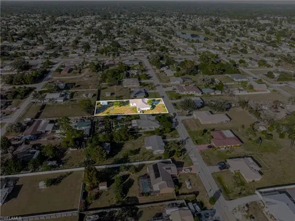 an aerial view of a city with lots of residential buildings