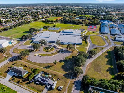 an aerial view of a swimming pool with a swimming pool