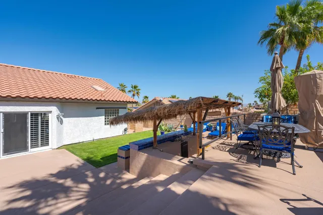 a front view of a house with dining area