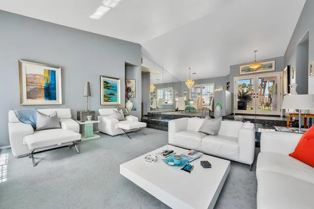 a kitchen with stainless steel appliances granite countertop a refrigerator stove and microwave