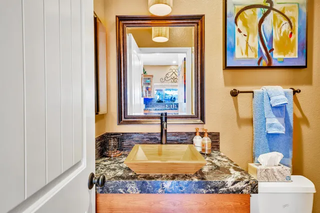 a living room with furniture and a patio