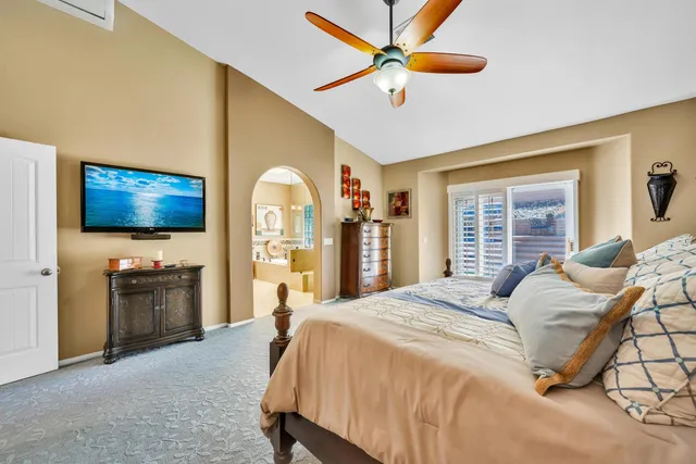a front view of a house with yard tables and chairs