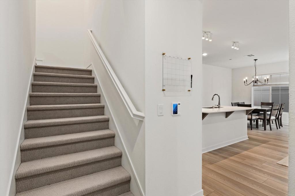 227 Canopy Trails Place Fallbrook, CA 92028 - Photo 19 of 66 a view of dining room with furniture and wooden floor