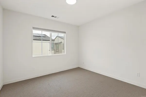 a view of a water with a building in the background