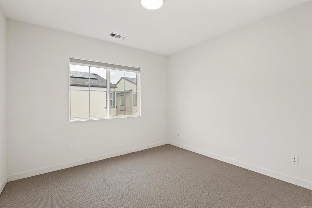 227 Canopy Trails Place Fallbrook, CA 92028 - Photo 32 of 66 an empty room with a window
