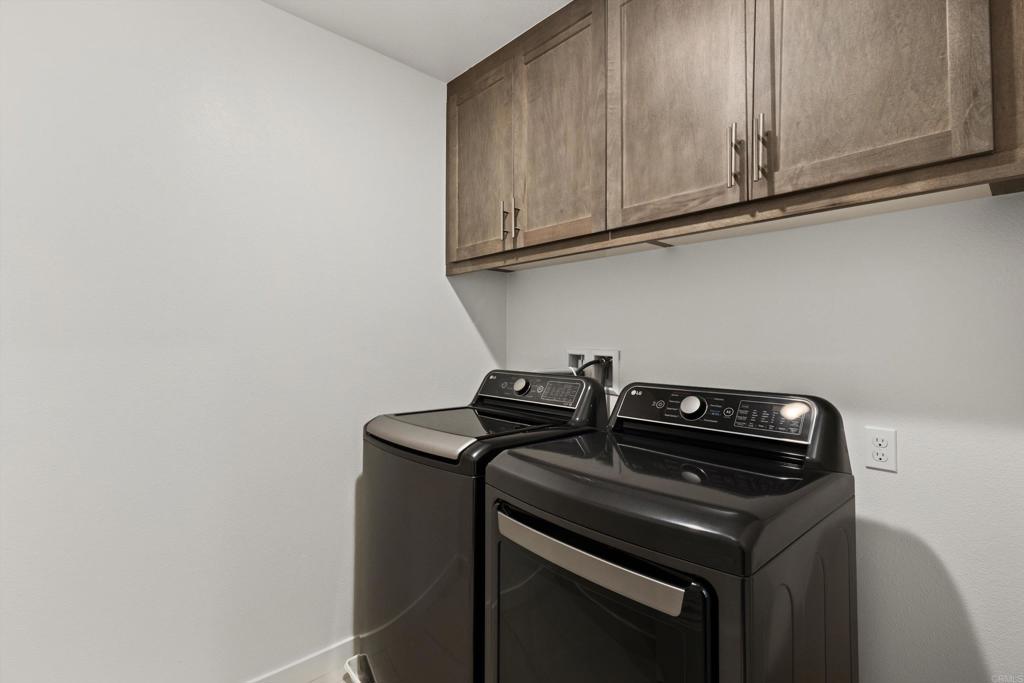 227 Canopy Trails Place Fallbrook, CA 92028 - Photo 33 of 66 a close up of a stove and cabinets