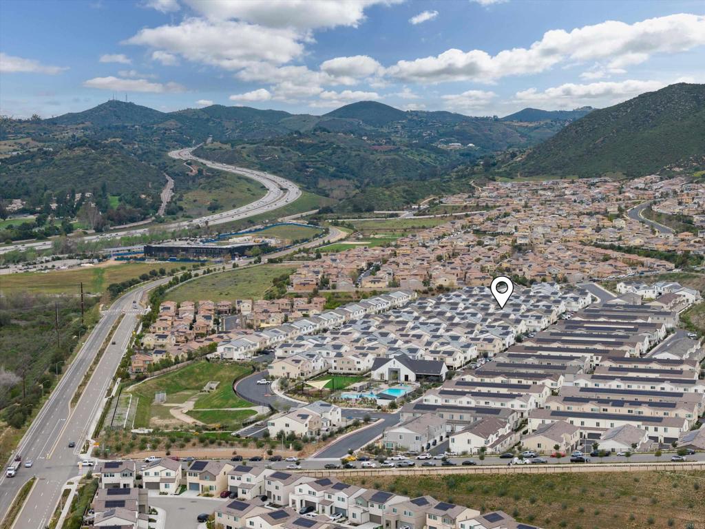 227 Canopy Trails Place Fallbrook, CA 92028 - Photo 43 of 66 a view of a lake with a mountain