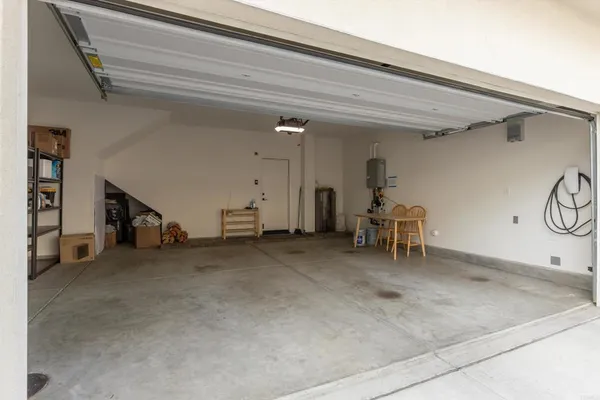 a view of outdoor space with swimming pool and furniture
