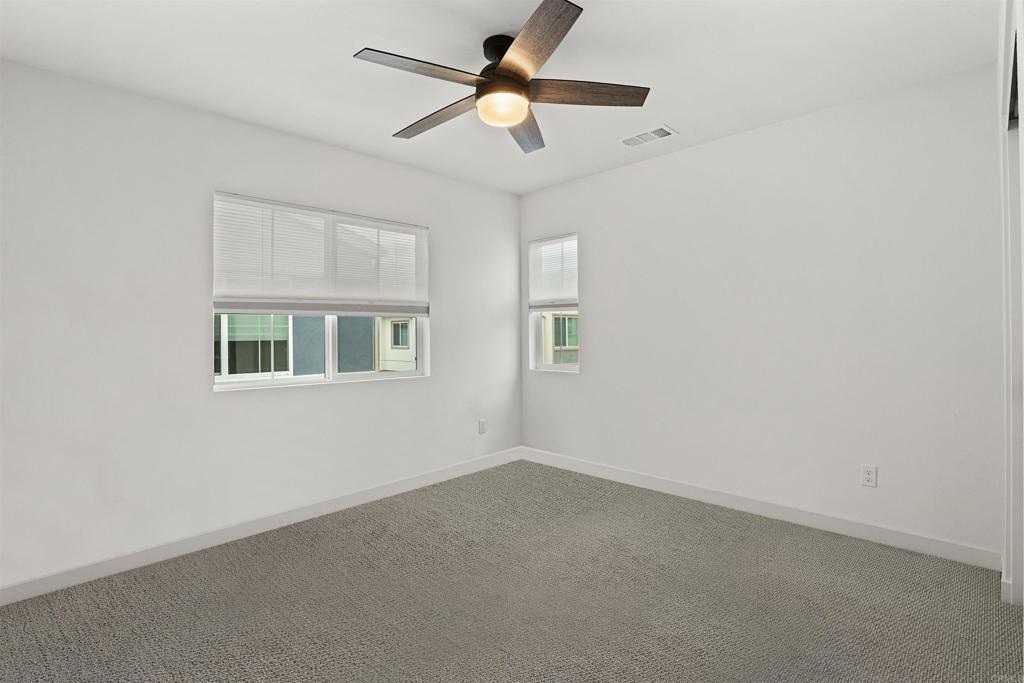 227 Canopy Trails Place Fallbrook, CA 92028 - Photo 5 of 66 a view of an empty room with a window