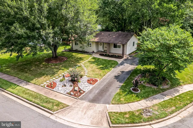 a view of a garden with a sitting area