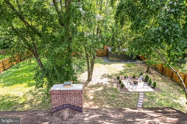 a view of a yard with an outdoor space