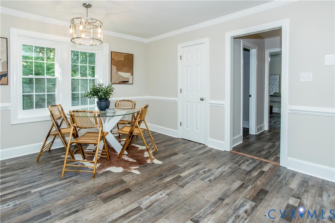 13110 Hensley Road Midlothian, VA 23112 - Photo 6 of 24 a view of a dining room with furniture window and wooden floor
