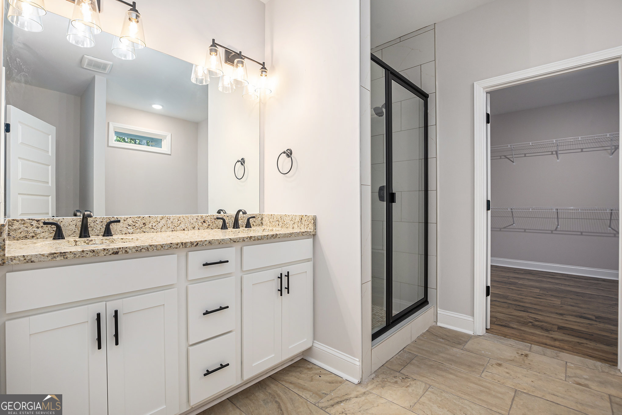 138 Crest Pointe Bremen, GA 30110 - Photo 15 of 22 a bathroom with a granite countertop sink mirror and double