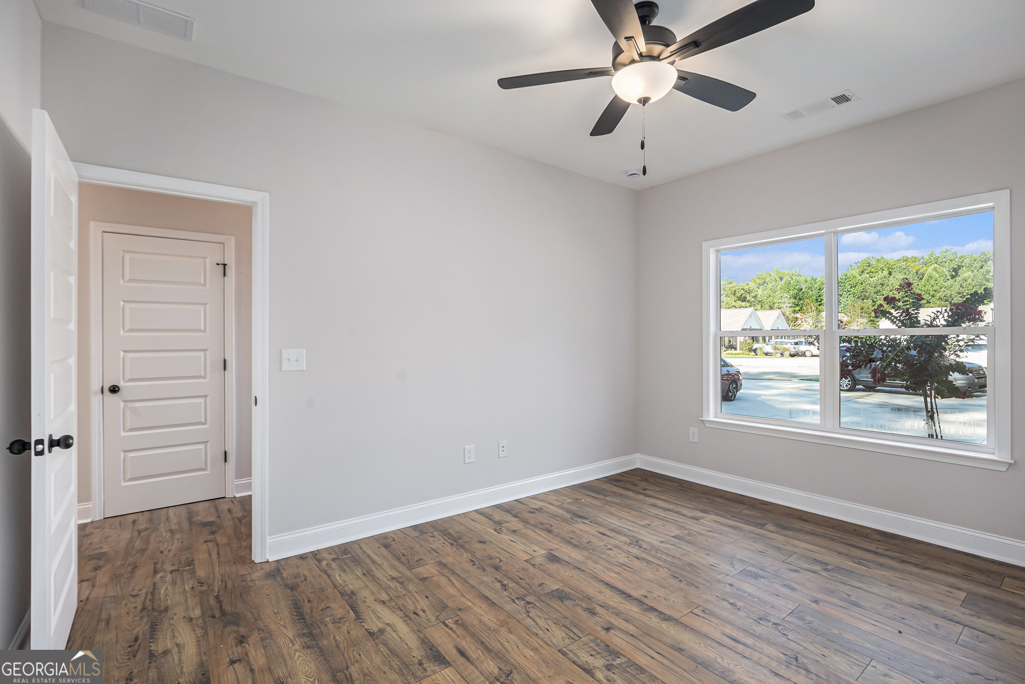 138 Crest Pointe Bremen, GA 30110 - Photo 18 of 22 wooden floor in an empty room with a window