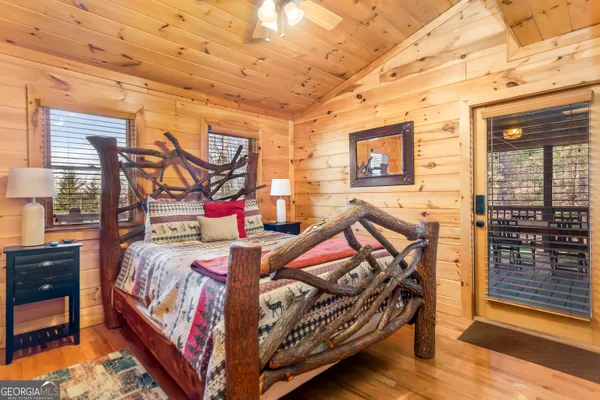 a bed room with a bed and a window