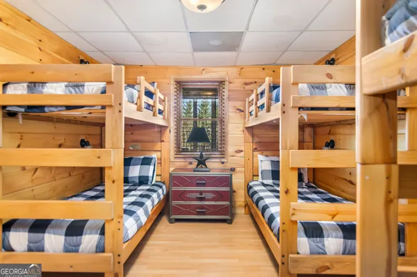 a balcony with furniture and a potted plant