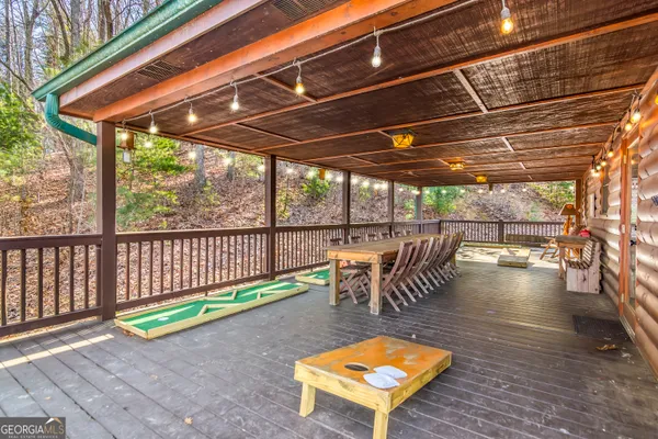 a view of a swimming pool with a patio