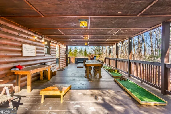 a view of a swimming pool with a patio