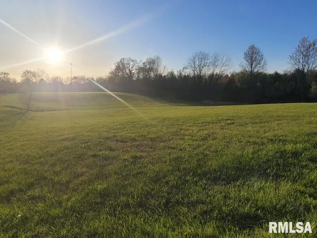 a view of an ocean and a mountain