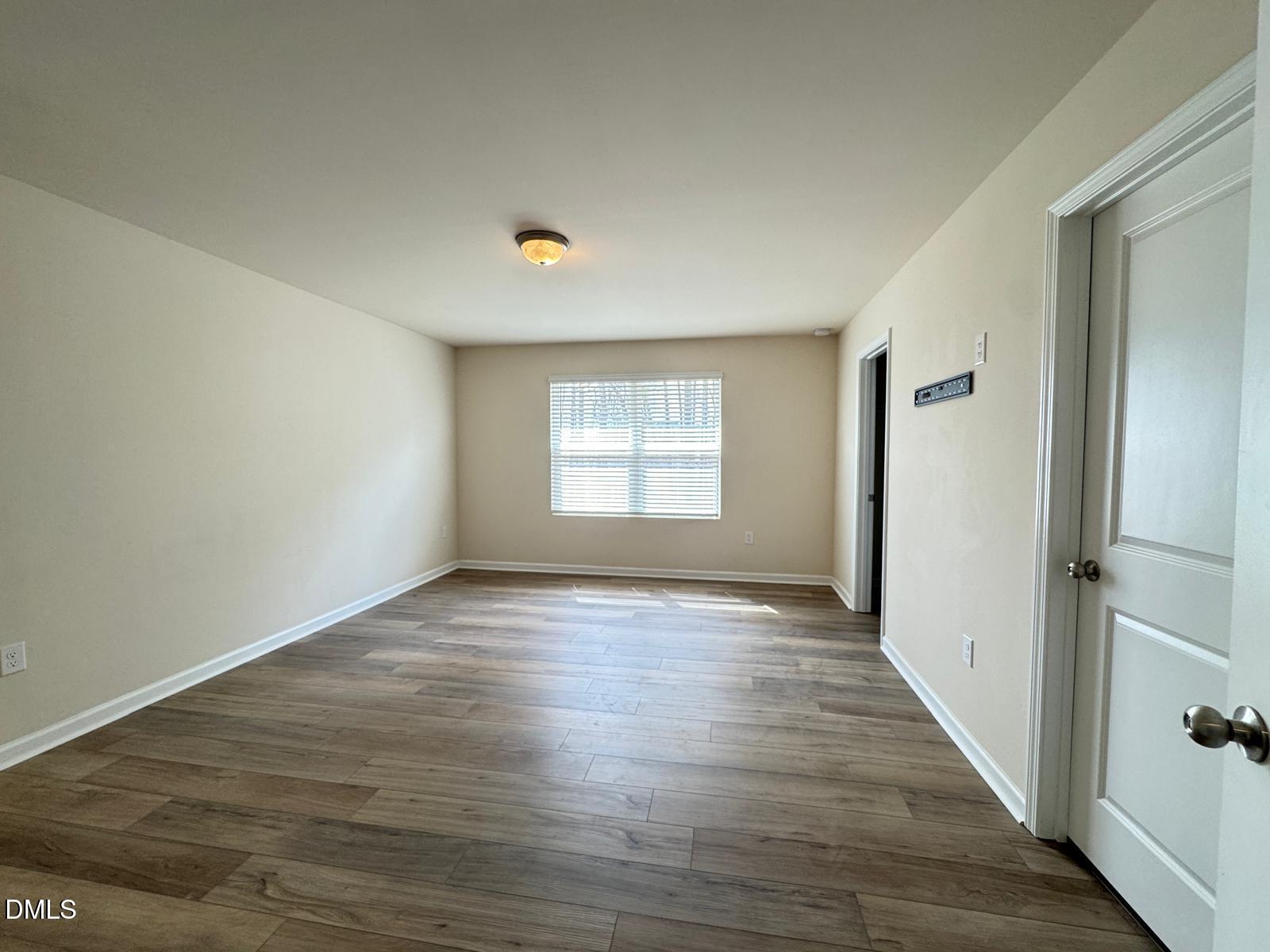 3440 Pinnacle Peak Drive Raleigh, NC 27604 - Photo 17 of 31 a view of an empty room and window