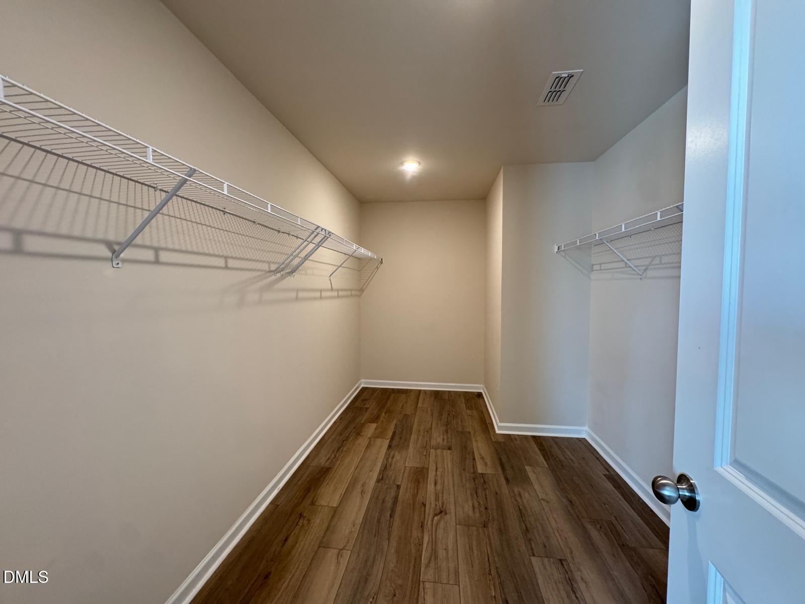 3440 Pinnacle Peak Drive Raleigh, NC 27604 - Photo 18 of 31 a view of a hallway with wooden floor