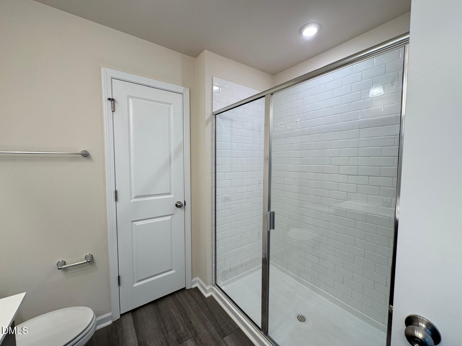 3440 Pinnacle Peak Drive Raleigh, NC 27604 - Photo 20 of 31 a bathroom with a shower and toilet