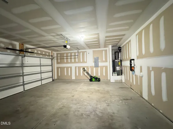 a view of an empty room with windows