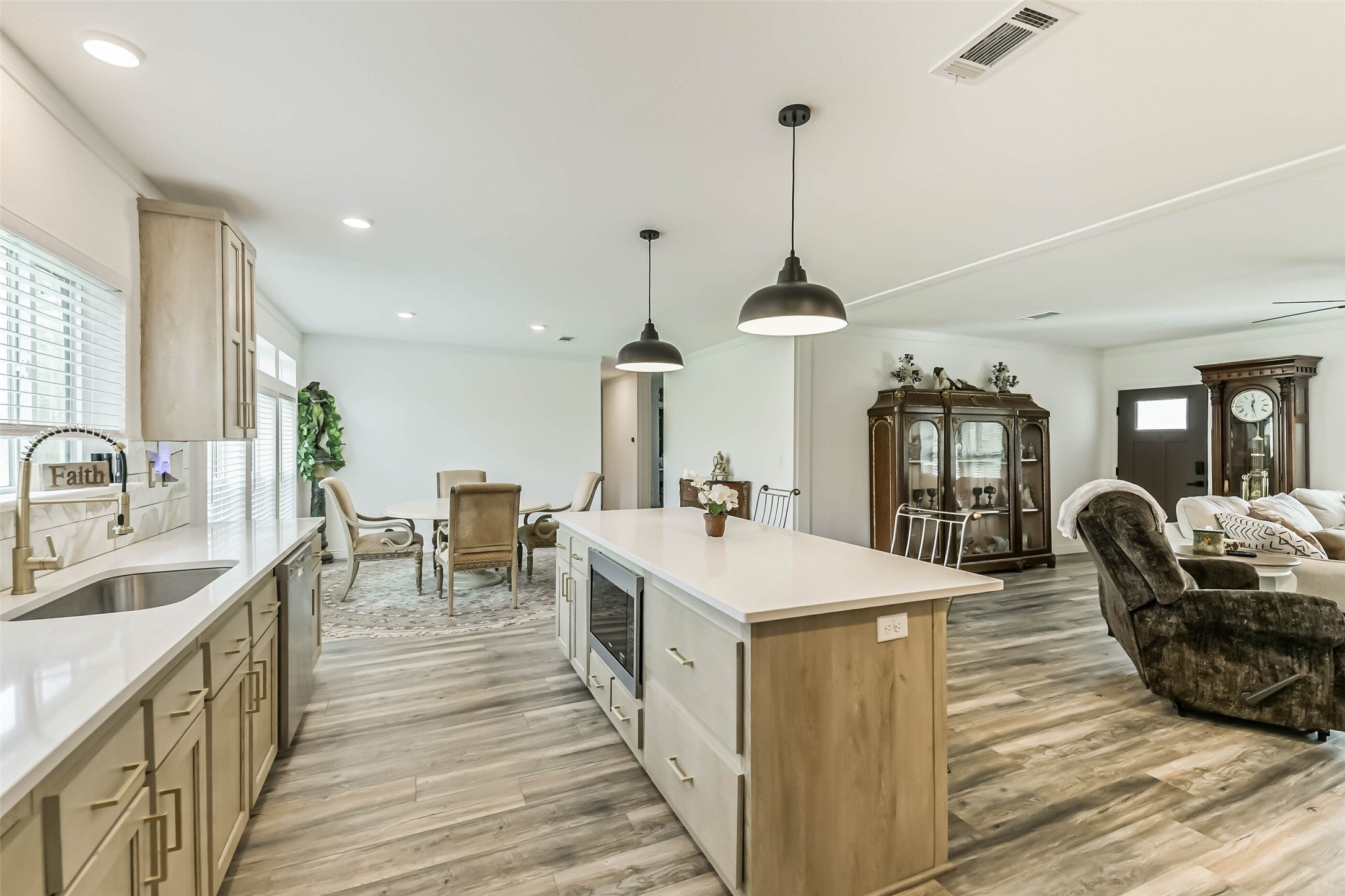 17700 Fregia Road Hull, TX 77564 - Photo 3 of 42 Quartz Counters in an open concept living space