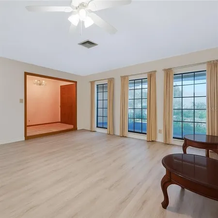 a living room with furniture and window