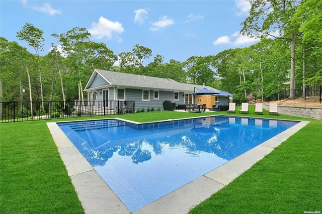 a view of a house with a swimming pool