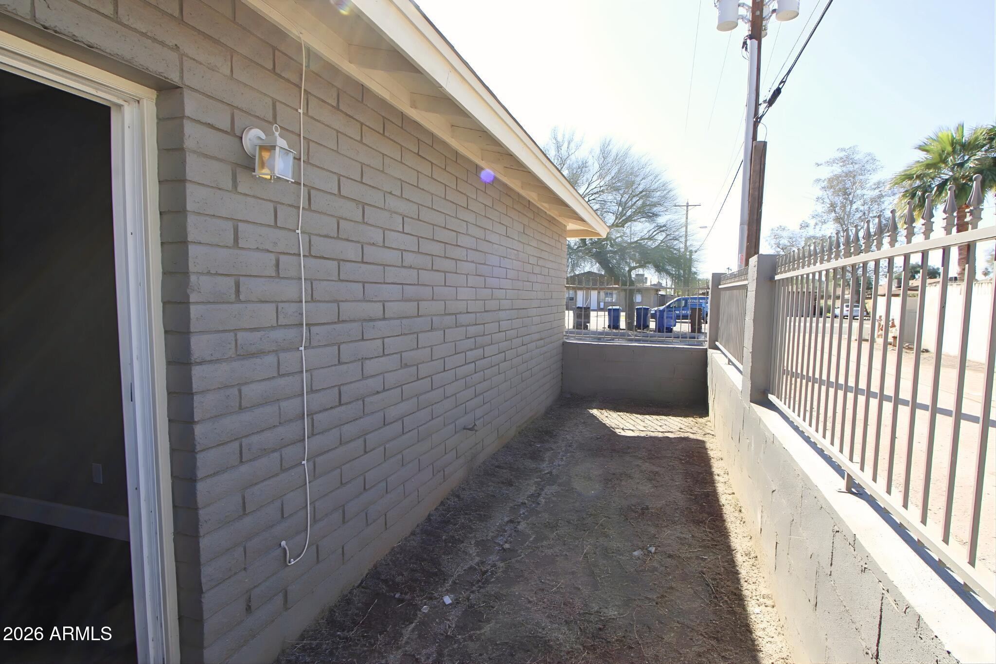550 West 9th Street, Unit 4 Mesa, AZ 85201 - Photo 8 of 11 a view of a pathway of a house
