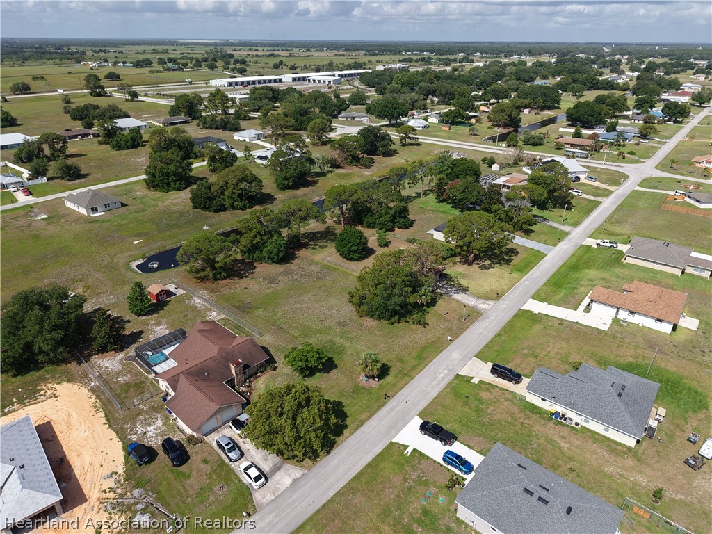 7900 Granada Road Sebring, FL 33876 - Photo 3 of 11 an aerial view of residential houses with outdoor space