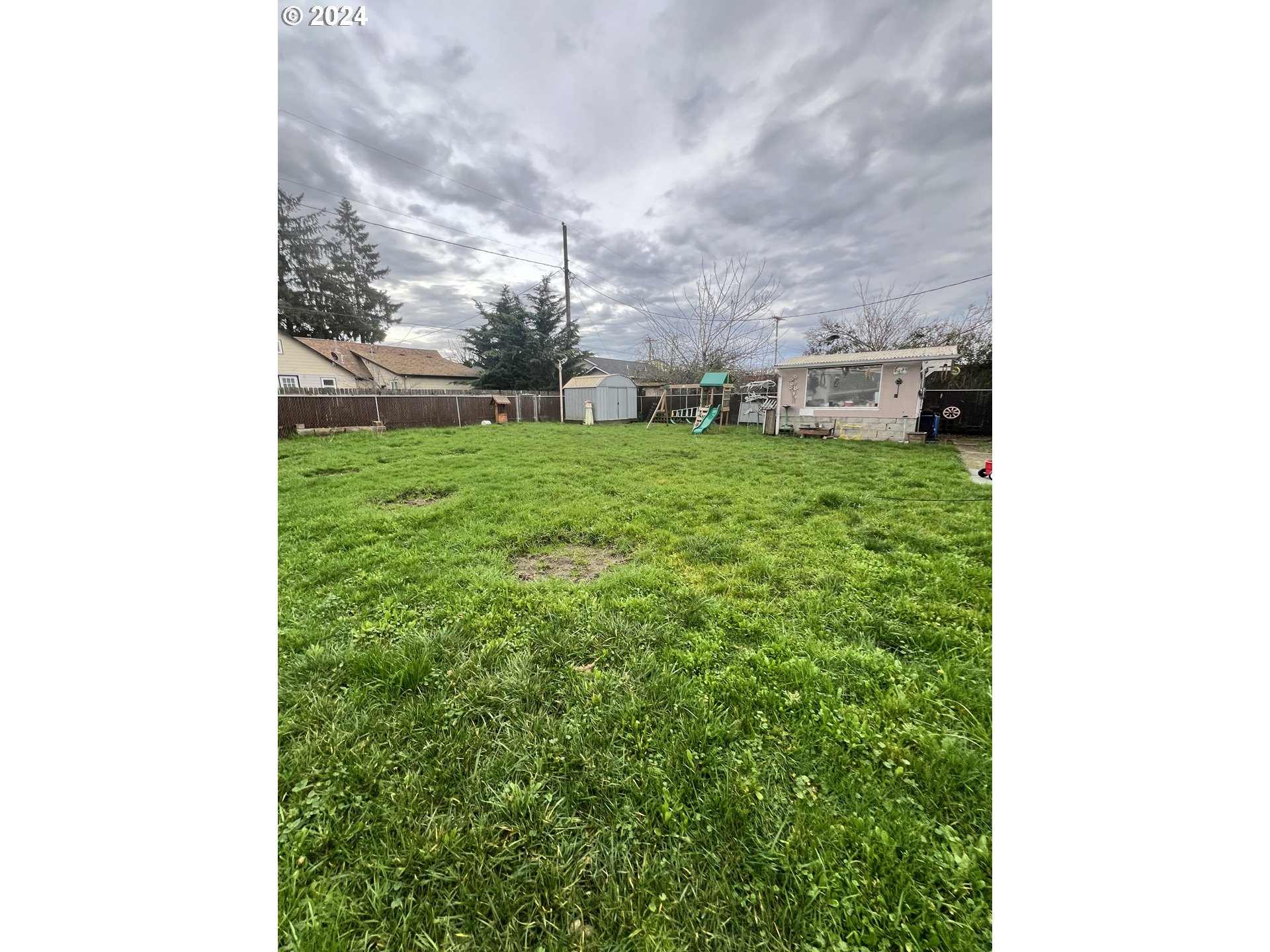 271 22nd Street Springfield, OR 97477 - Photo 19 of 28 a view of a yard in front of a house
