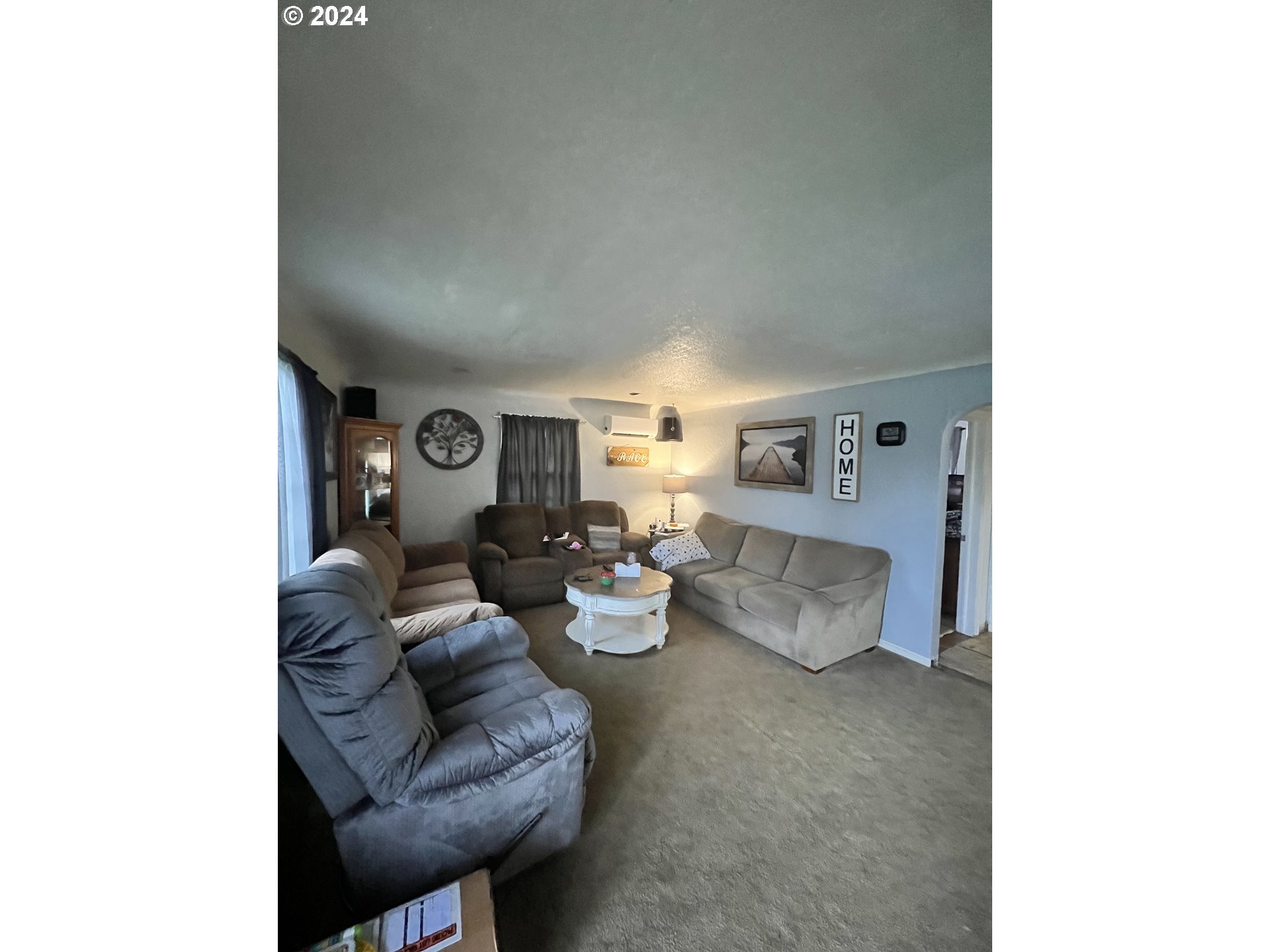 271 22nd Street Springfield, OR 97477 - Photo 3 of 28 a living room with furniture and wooden floor