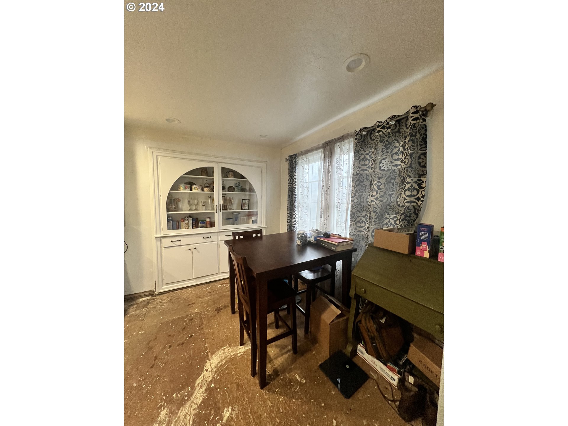 271 22nd Street Springfield, OR 97477 - Photo 5 of 28 a view of a workspace with furniture and a window