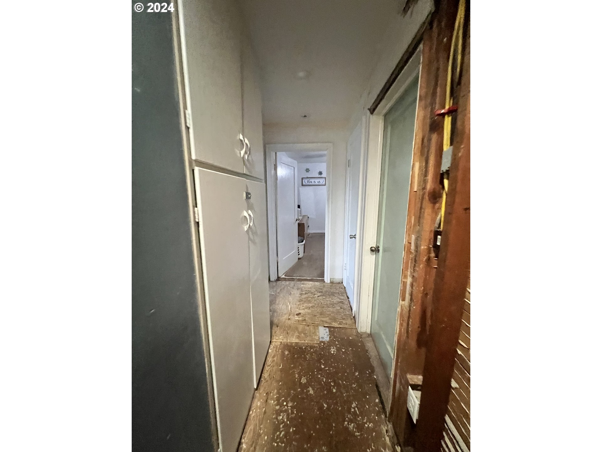 271 22nd Street Springfield, OR 97477 - Photo 9 of 28 a view of a hallway with wooden floor