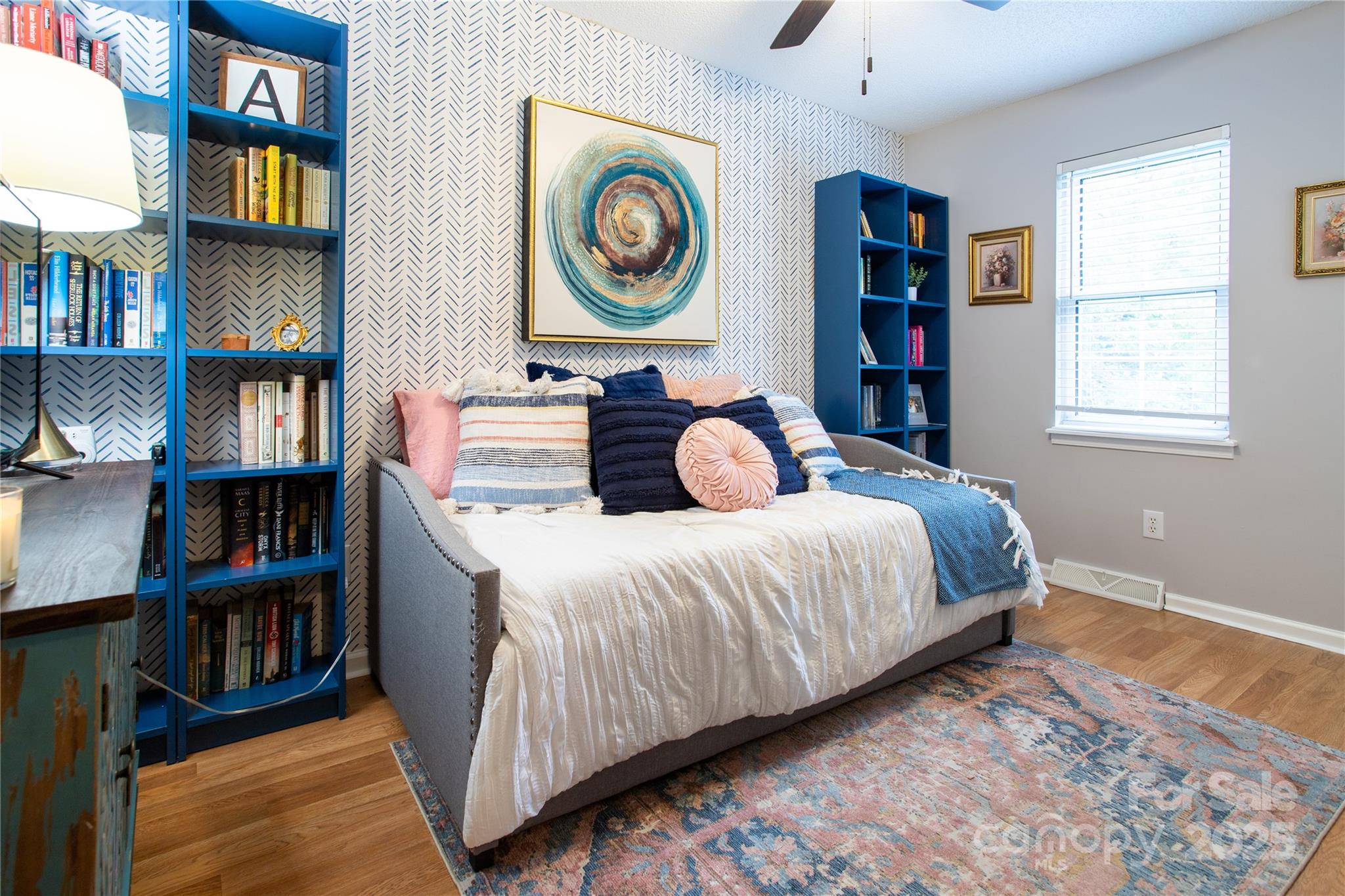 1735 Kallaramo Road Rock Hill, SC 29732 - Photo 19 of 30 a bedroom with a bed and a book shelf