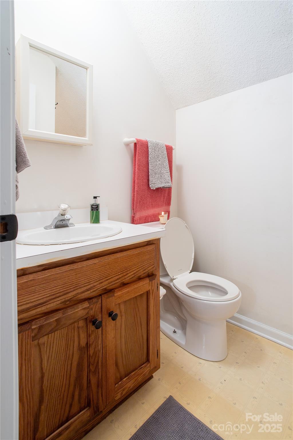1735 Kallaramo Road Rock Hill, SC 29732 - Photo 23 of 30 a bathroom with a toilet sink and mirror