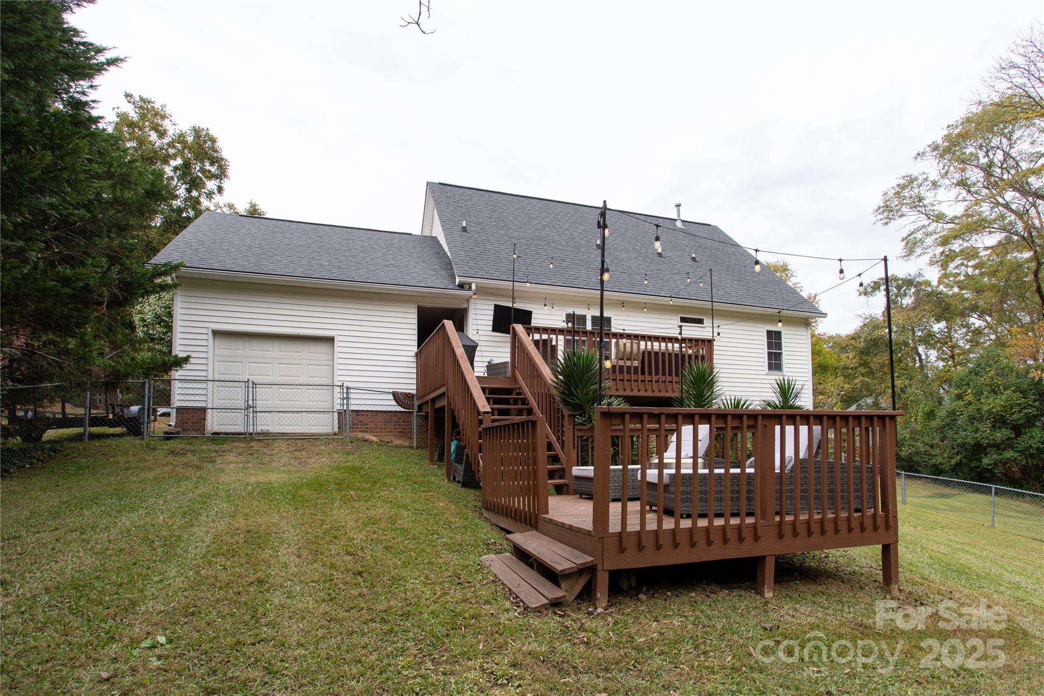 1735 Kallaramo Road Rock Hill, SC 29732 - Photo 29 of 30 a view of a house with a deck and a yard