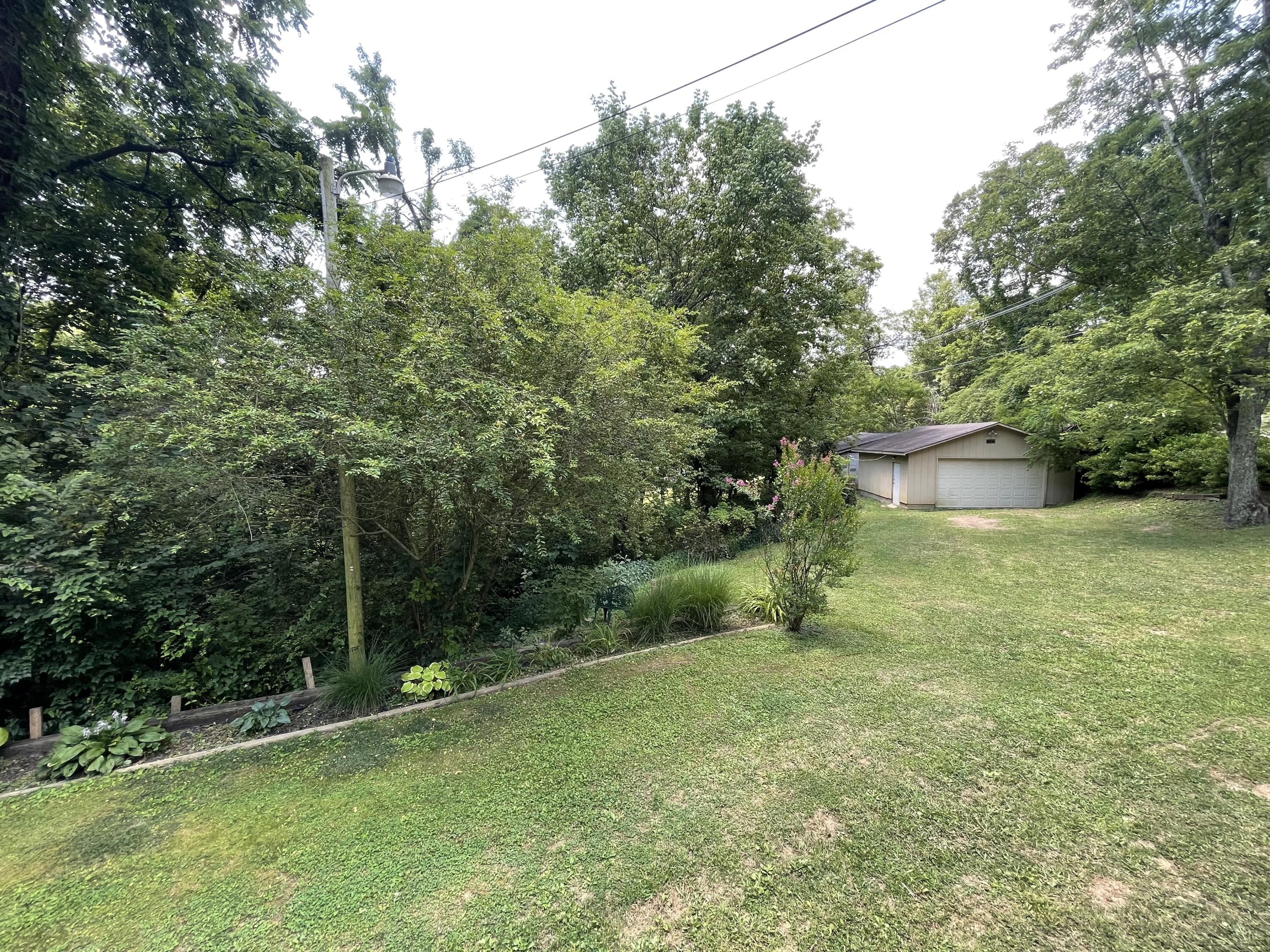 1418 Cherry Bottom Road Caryville, TN 37714 - Photo 2 of 34 IMG_9801