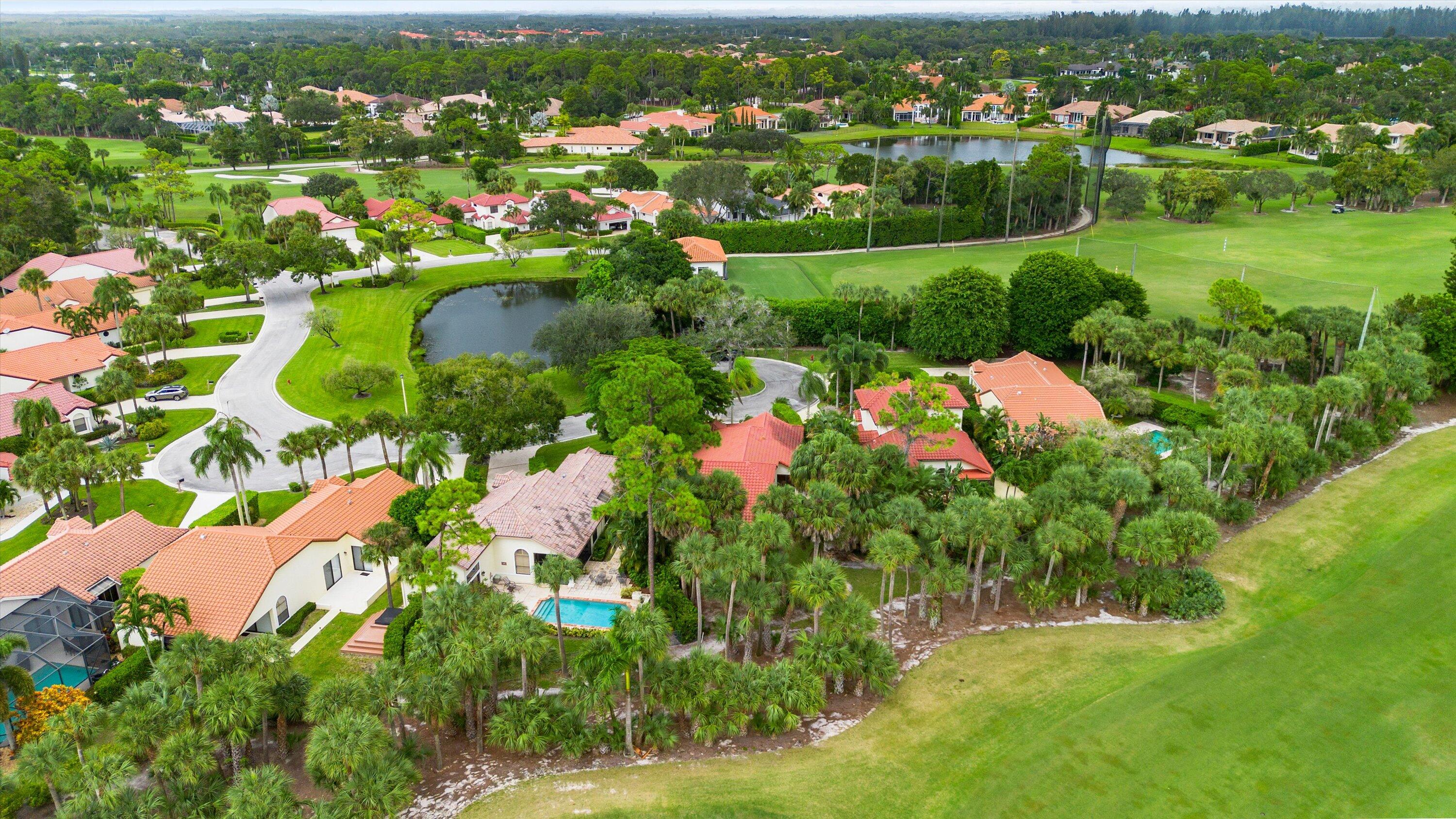 1535 Fairway Terrace West Palm Beach, FL 33411 - Photo 24 of 47 an aerial view of residential houses with outdoor space and trees
