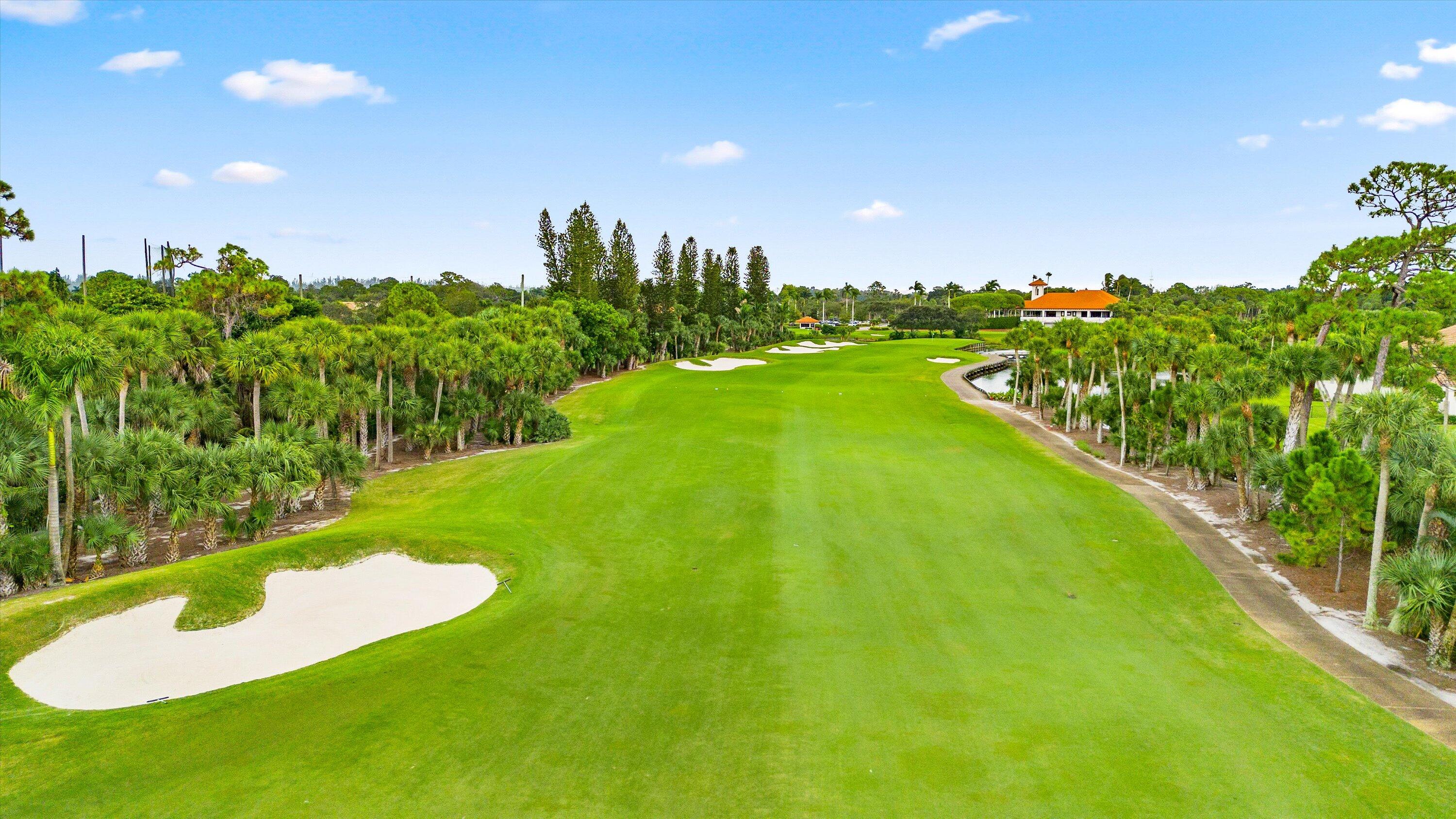 1535 Fairway Terrace West Palm Beach, FL 33411 - Photo 26 of 47 a view of a golf course with a lake view