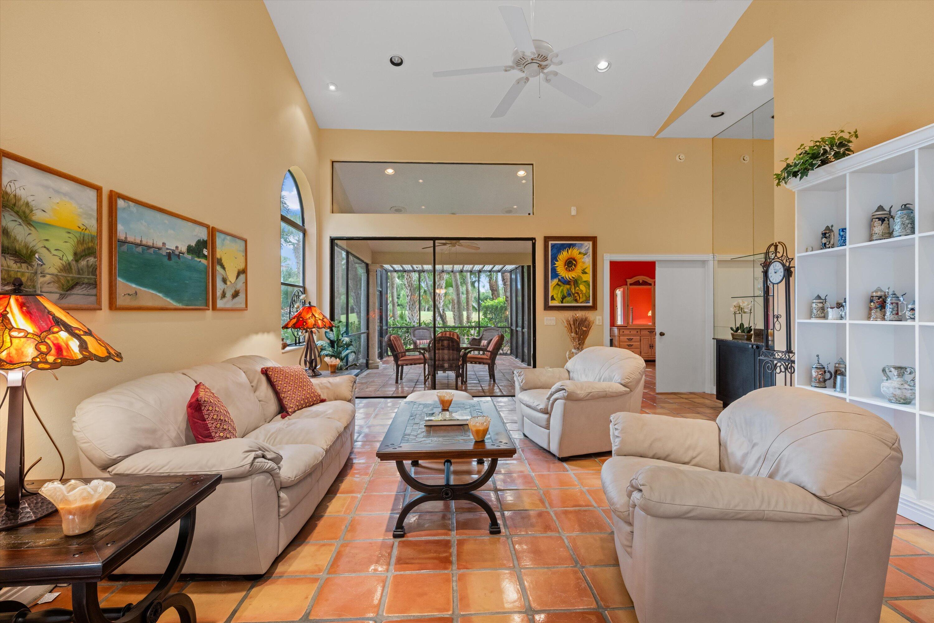 1535 Fairway Terrace West Palm Beach, FL 33411 - Photo 3 of 47 a living room with furniture kitchen view and a large window