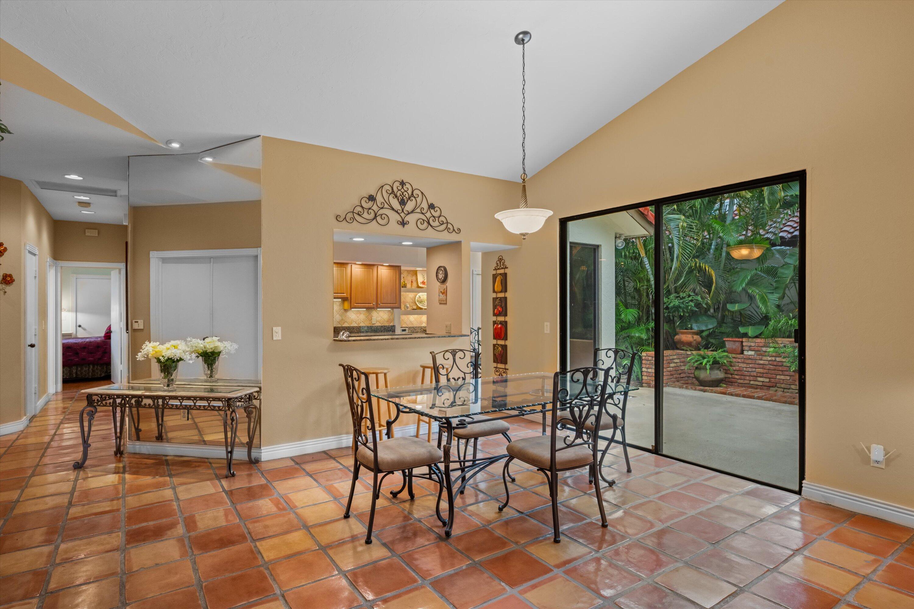 1535 Fairway Terrace West Palm Beach, FL 33411 - Photo 7 of 47 a view of a dining room with furniture window and outside view