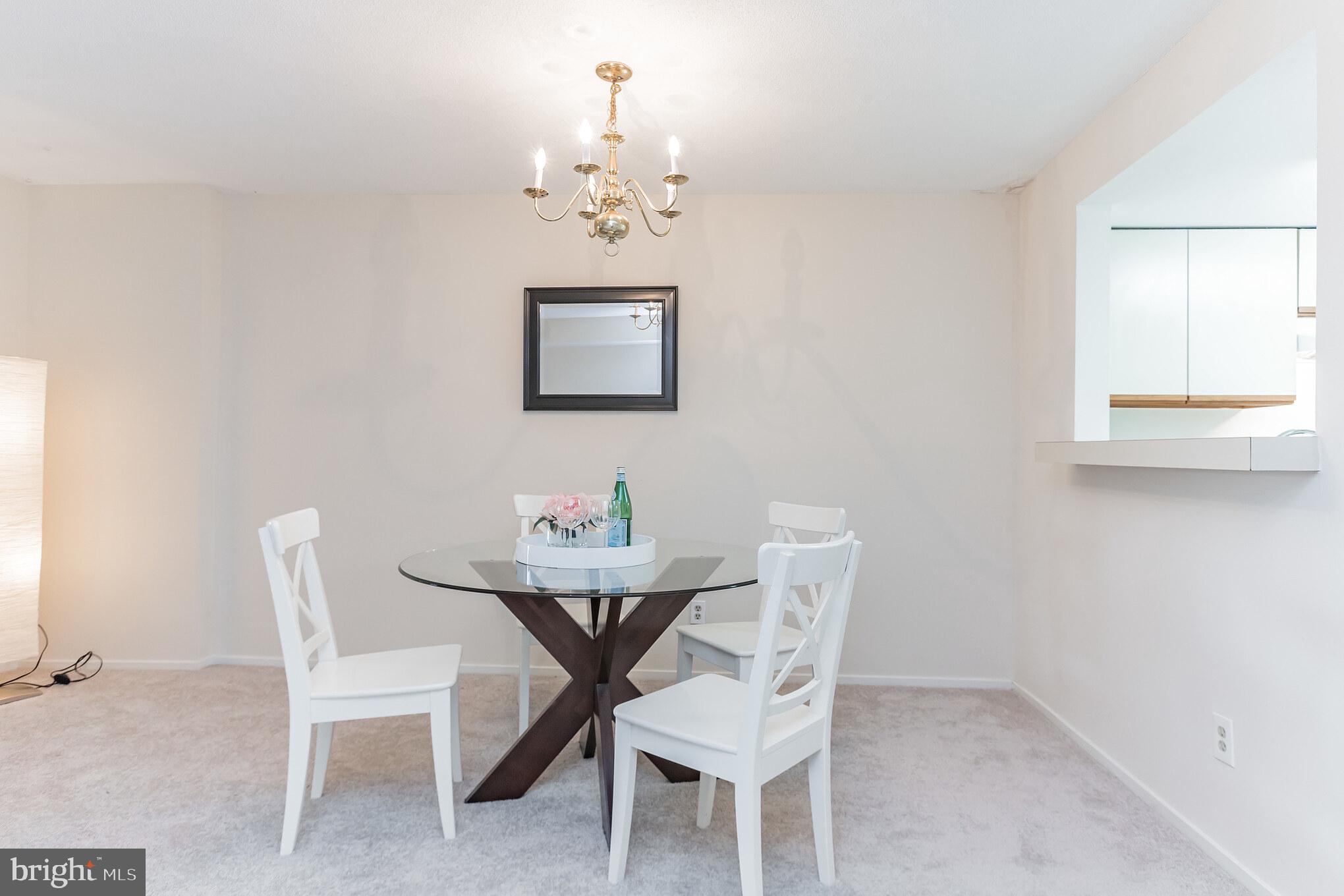 1951 Sagewood Lane, Unit 509 Reston, VA 20191 - Photo 6 of 32 Kitchen open to dining area